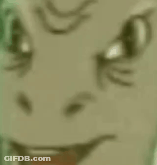A Close Up Of A Cartoon Character 'S Face With A Red Tongue . GIF