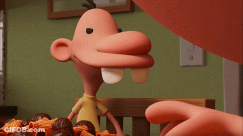 A Close Up Of A Cartoon Character 'S Face With A White Tooth GIF