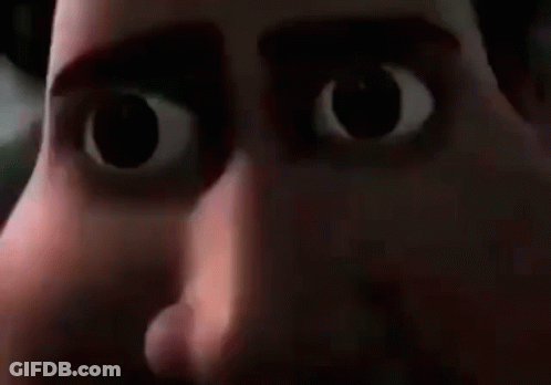 A Close Up Of A Cartoon Character 'S Face With Big Eyes And A Mouth Open . GIF