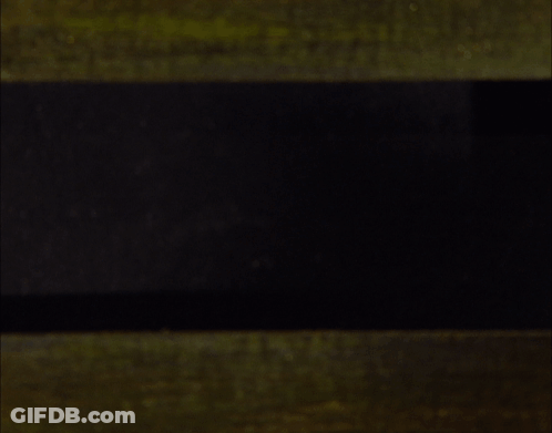 A Close Up Of A Cartoon Character 'S Face With Big Eyes And A Mustache GIF