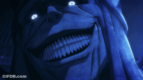 A Close Up Of A Cartoon Character 'S Face With Glowing Eyes And Teeth GIF