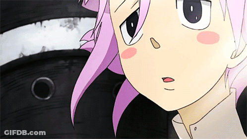 A Close Up Of A Cartoon Character 'S Face With Pink Hair GIF