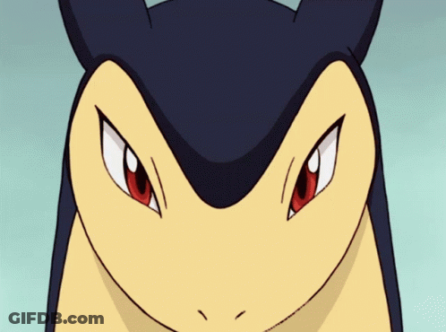 A Close Up Of A Cartoon Character 'S Face With Red Eyes And Sharp Teeth GIF