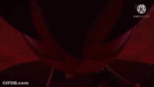 A Close Up Of A Cartoon Character 'S Face With Red Eyes . GIF