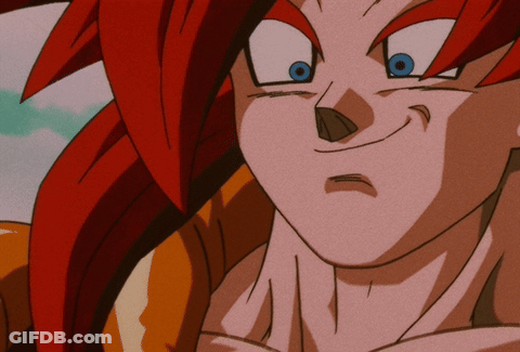 A Close Up Of A Cartoon Character 'S Face With Red Hair And Blue Eyes GIF