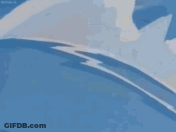 A Close Up Of A Cartoon Character 'S Face With Snow Falling On It 'S Head . GIF