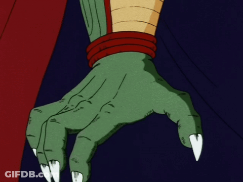 A Close Up Of A Cartoon Character 'S Hand With Long White Claws GIF