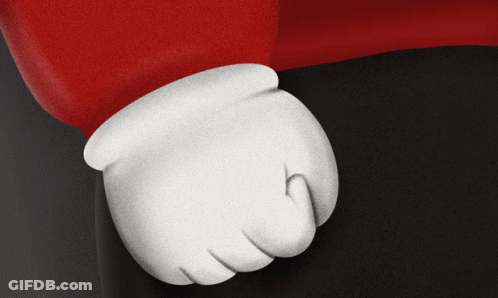 A Close Up Of A Cartoon Character 'S Hand With White Gloves GIF