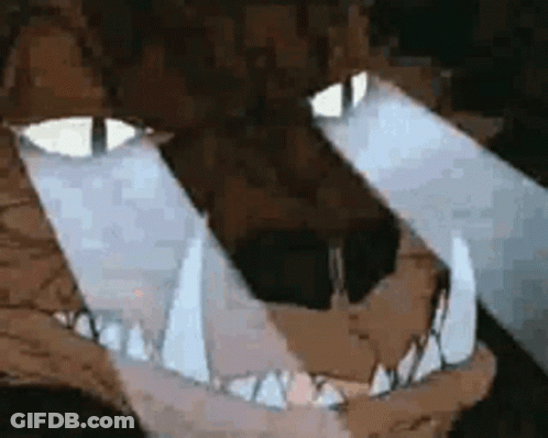 A Close Up Of A Cartoon Character 'S Mouth And Eyes With A Light Coming Out Of It . GIF