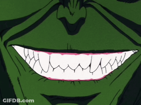 A Close Up Of A Cartoon Character 'S Mouth With Sharp Teeth And A Blue Tongue GIF