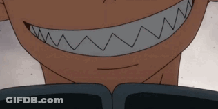 A Close Up Of A Cartoon Character 'S Mouth With Sharp Teeth And A Smile . GIF