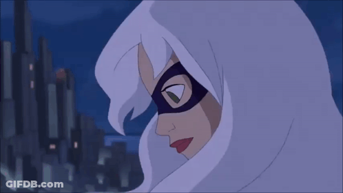 A Close Up Of A Cartoon Character Wearing A Purple Mask GIF