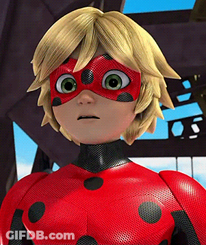 A Close Up Of A Cartoon Character Wearing A Red Costume GIF