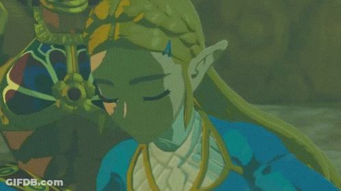 A Close Up Of A Cartoon Character With A Blue And White Outfit GIF