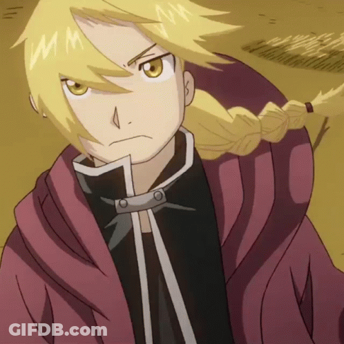 A Close Up Of A Cartoon Character With A Braid And The Letter M On His Face GIF