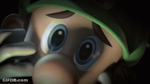 A Close Up Of A Cartoon Character With A Green Hat GIF