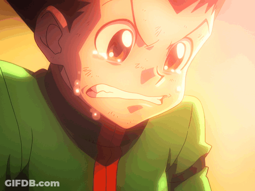 A Close Up Of A Cartoon Character With A Green Shirt And Red Tie GIF