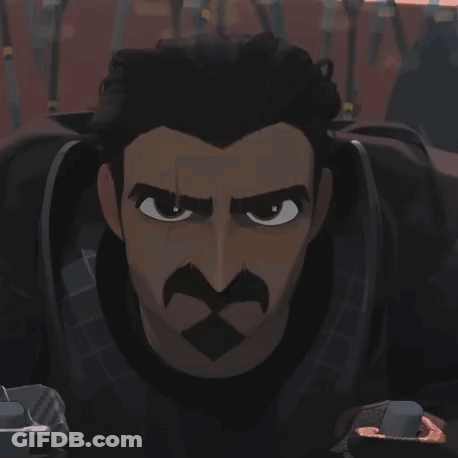 A Close Up Of A Cartoon Character With A Mustache Looking At The Camera GIF