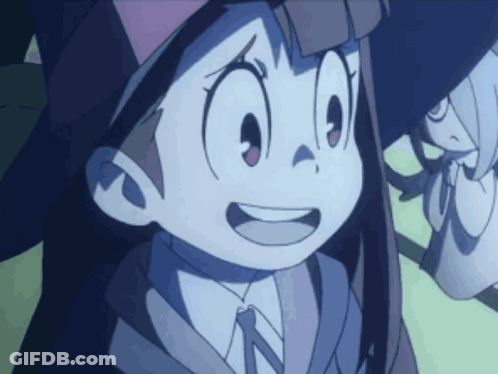 A Close Up Of A Cartoon Character With A N On Her Shirt GIF