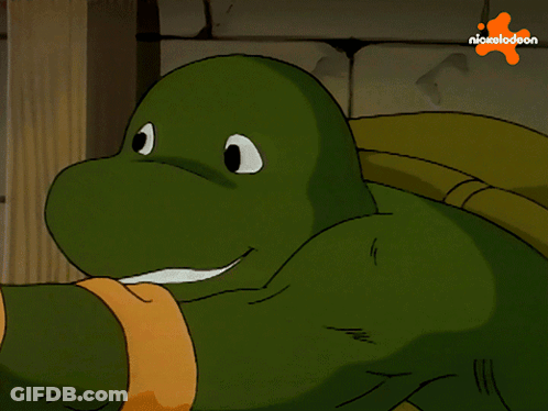 A Close Up Of A Cartoon Character With A Nickelodeon Logo In The Background GIF