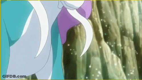 A Close Up Of A Cartoon Character With A Purple Flower In Her Hair Standing Next To A Rock Wall . GIF