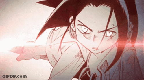 A Close Up Of A Cartoon Character With A Red Light Behind Her GIF