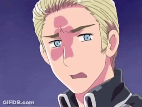 A Close Up Of A Cartoon Character With A Red Spot On His Forehead GIF