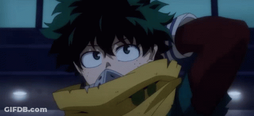 A Close Up Of A Cartoon Character With A Scarf Around His Face GIF