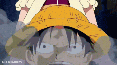 A Close Up Of A Cartoon Character With A Straw Hat On GIF