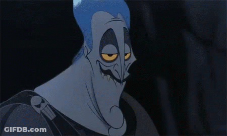 A Close Up Of A Cartoon Character With A Very Angry Face And Yellow Eyes . GIF