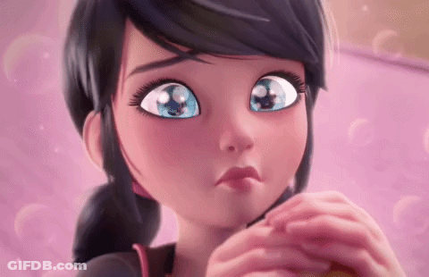 A Close Up Of A Cartoon Character With Big Blue Eyes . GIF