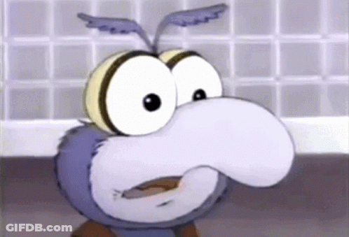 A Close Up Of A Cartoon Character With Big Eyes And Wings GIF