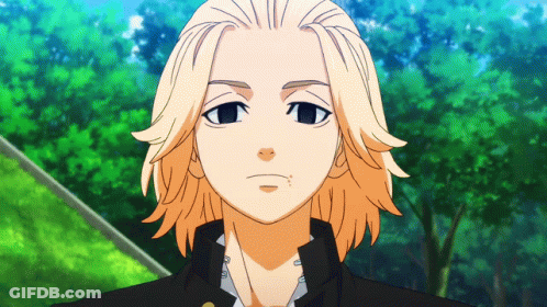 A Close Up Of A Cartoon Character With Blonde Hair And Blue Eyes GIF