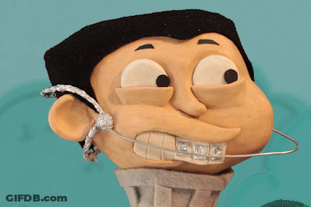 A Close Up Of A Cartoon Character With Braces GIF