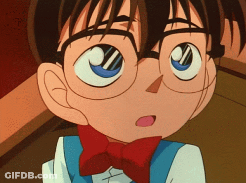A Close Up Of A Cartoon Character With Glasses And A Red Bow Tie GIF