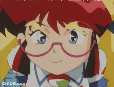 A Close Up Of A Cartoon Character With Glasses And Red Hair GIF