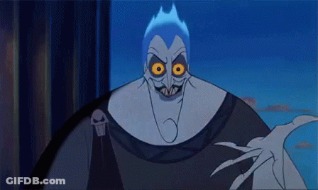 A Close Up Of A Cartoon Character With Glowing Eyes And A Skull On His Shoulder . GIF