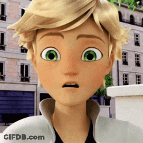 A Close Up Of A Cartoon Character With Green Eyes Making A Surprised Face GIF