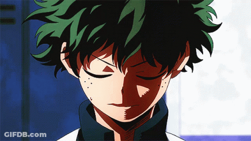 A Close Up Of A Cartoon Character With Green Hair GIF