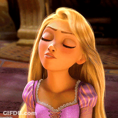 A Close Up Of A Cartoon Character With Her Eyes Closed GIF