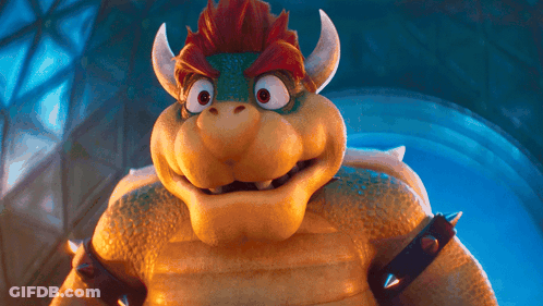 A Close Up Of A Cartoon Character With Horns And Spikes On His Arms GIF