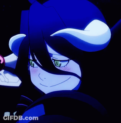 A Close Up Of A Cartoon Character With Horns On Her Head GIF