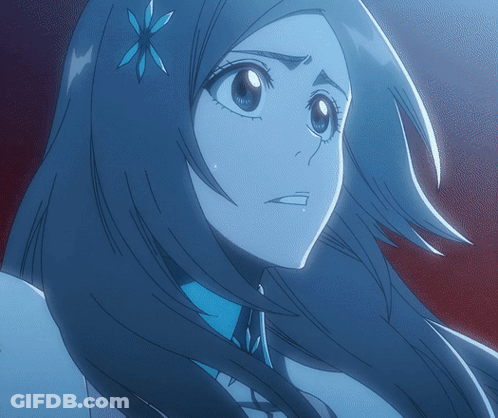 A Close Up Of A Cartoon Character With Long Hair And A Flower In Her Hair GIF