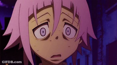 A Close Up Of A Cartoon Character With Pink Hair Making A Funny Face GIF