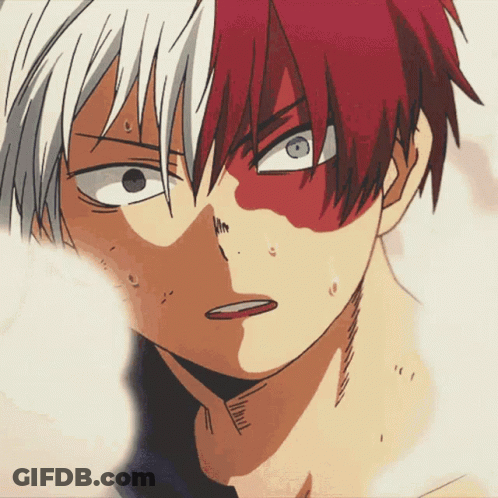 A Close Up Of A Cartoon Character With Red And White Hair GIF