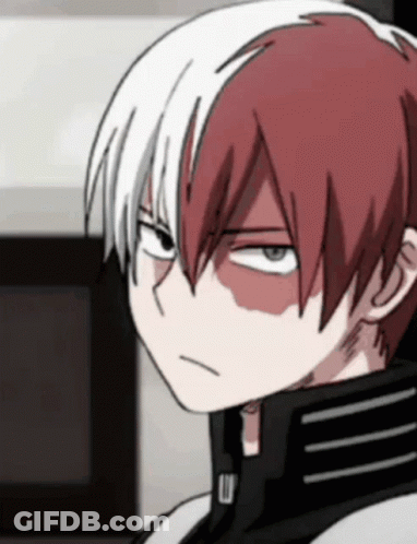 A Close Up Of A Cartoon Character With Red And White Hair GIF