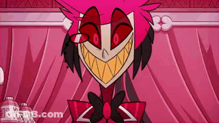 A Close Up Of A Cartoon Character With Red Eyes And A Big Smile . GIF