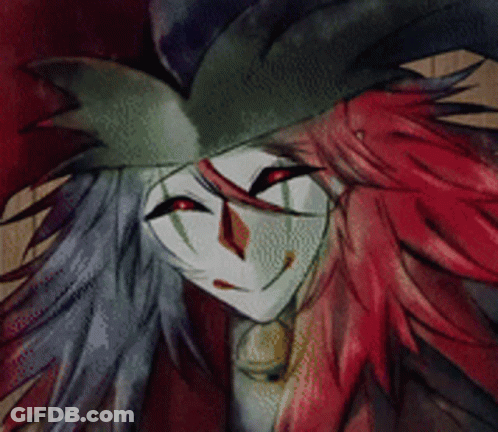 A Close Up Of A Cartoon Character With Red Hair GIF