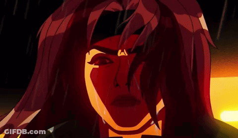 A Close Up Of A Cartoon Character With Red Hair GIF