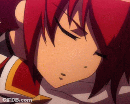 A Close Up Of A Cartoon Character With Red Hair GIF